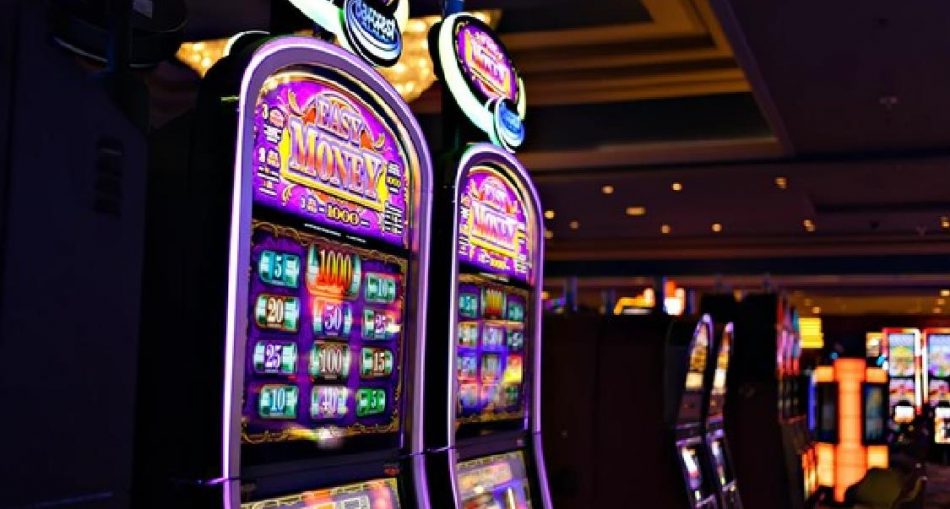 Who developed the first slot machine